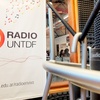 Logo 100 años de Radio Universitaria desde Tierra del Fuego