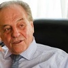 Logo Carlos Heller con Pablo Caruso
